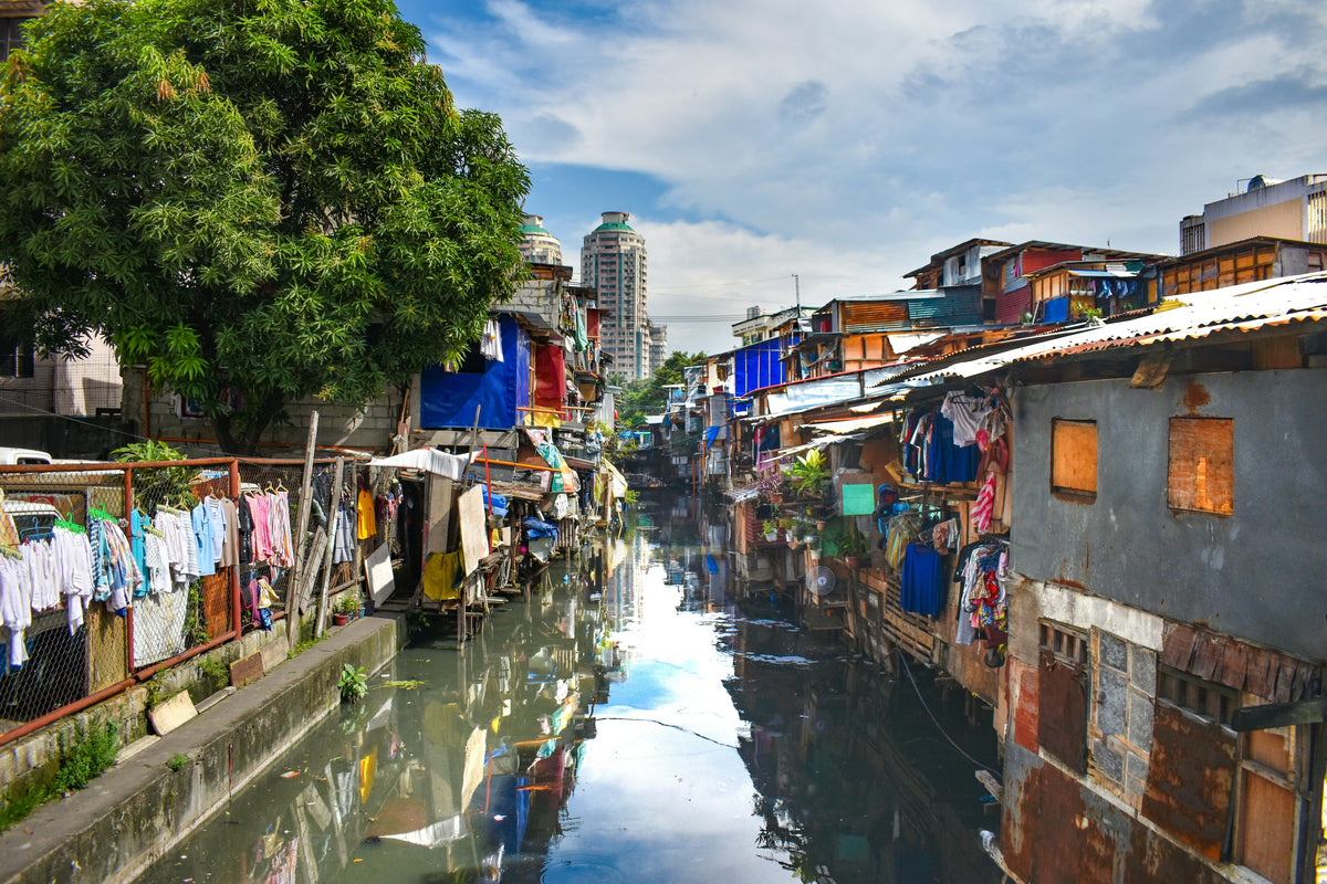 Caring for Impoverished Children outside Manilla