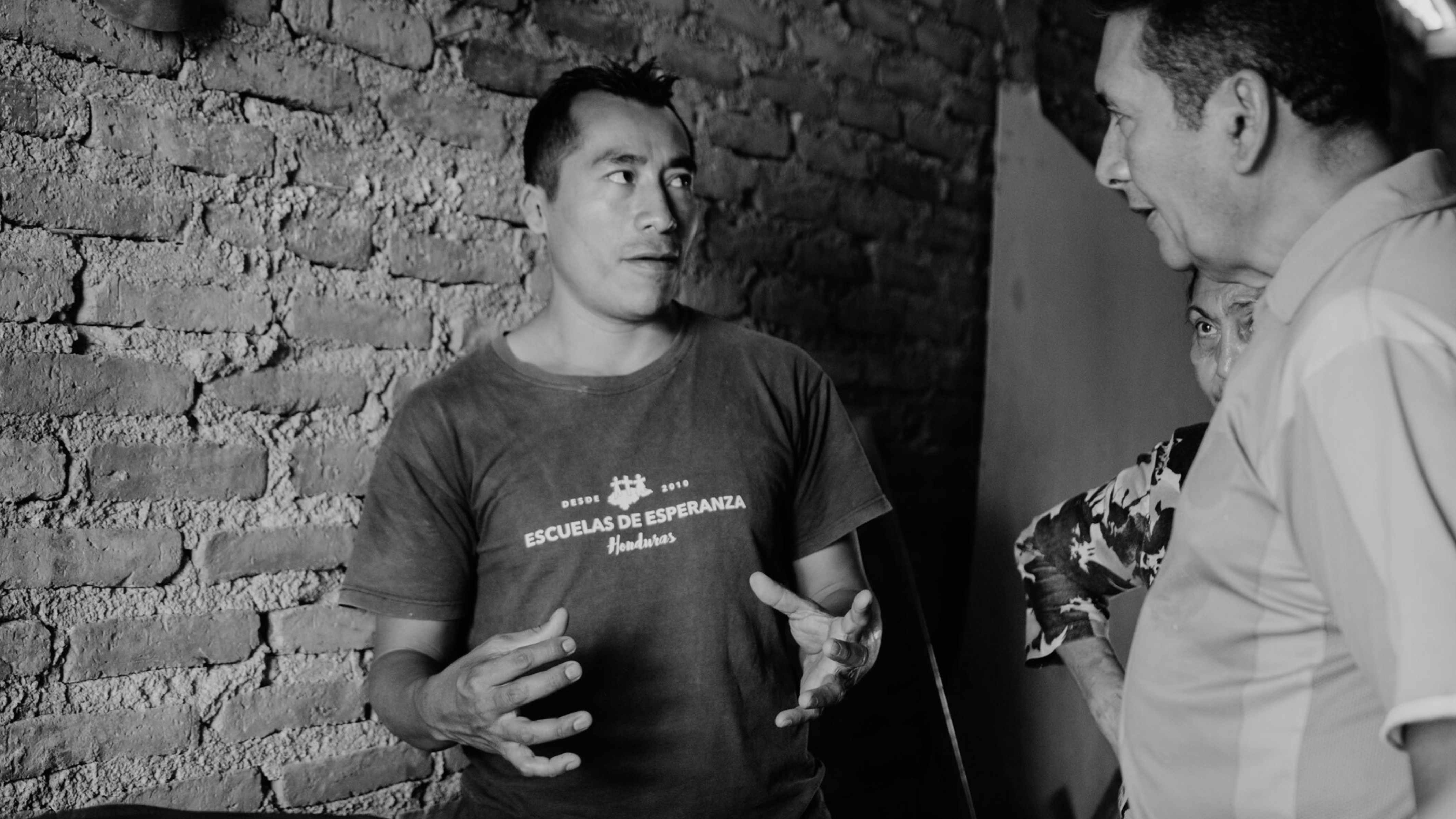 men conversing