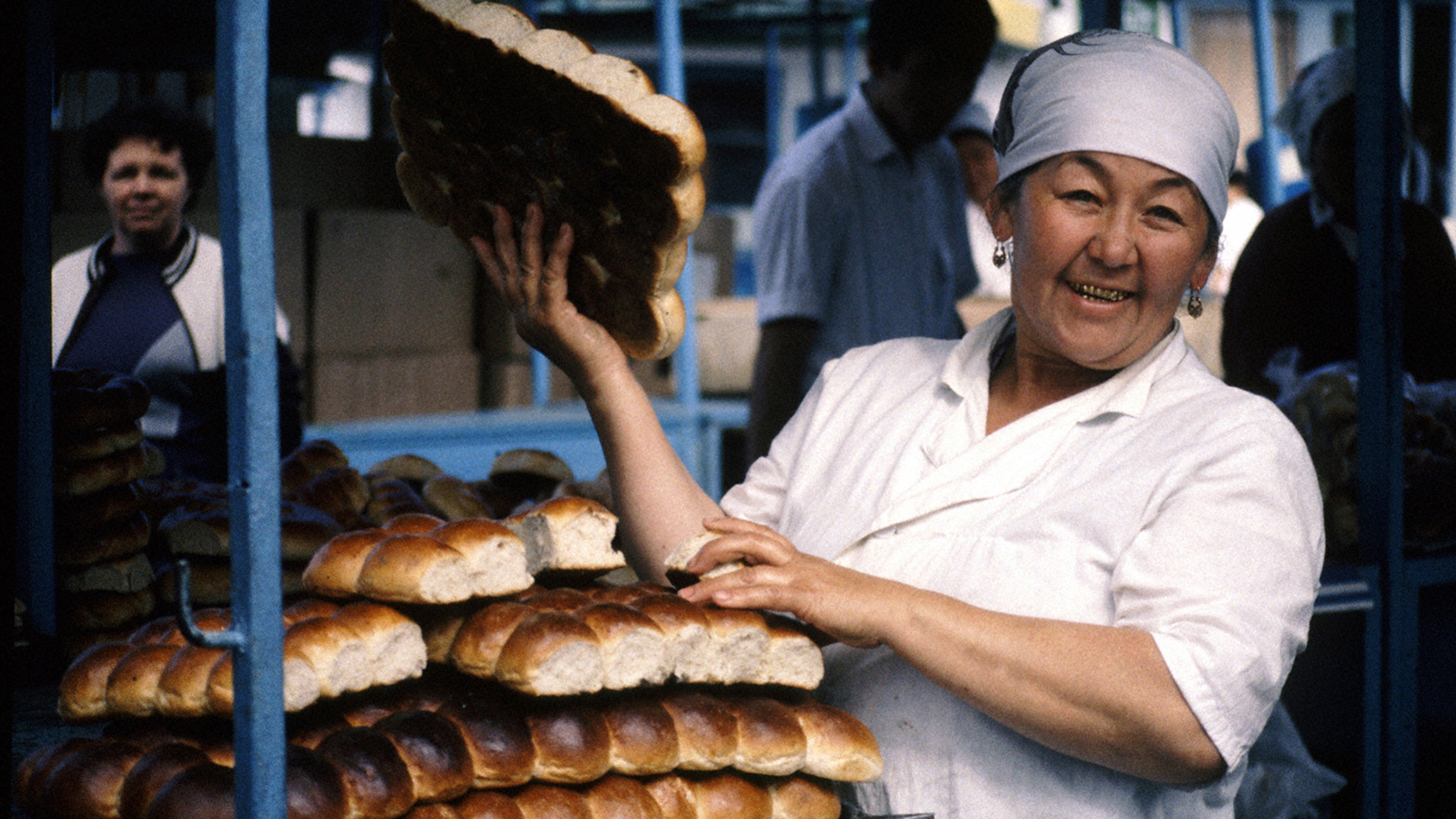 baker holding bread